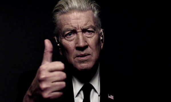 Gordon Cole (David Lynch) gives a thumbs up in total darkness in an episode of Twin Peaks: The Return